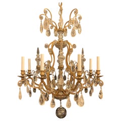 Magnifique grand lustre français à 8 feux Louis XVI en cristal de roche doré et or
