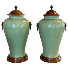 Pair of large Celadon Pottery Urns with Wooden Lids