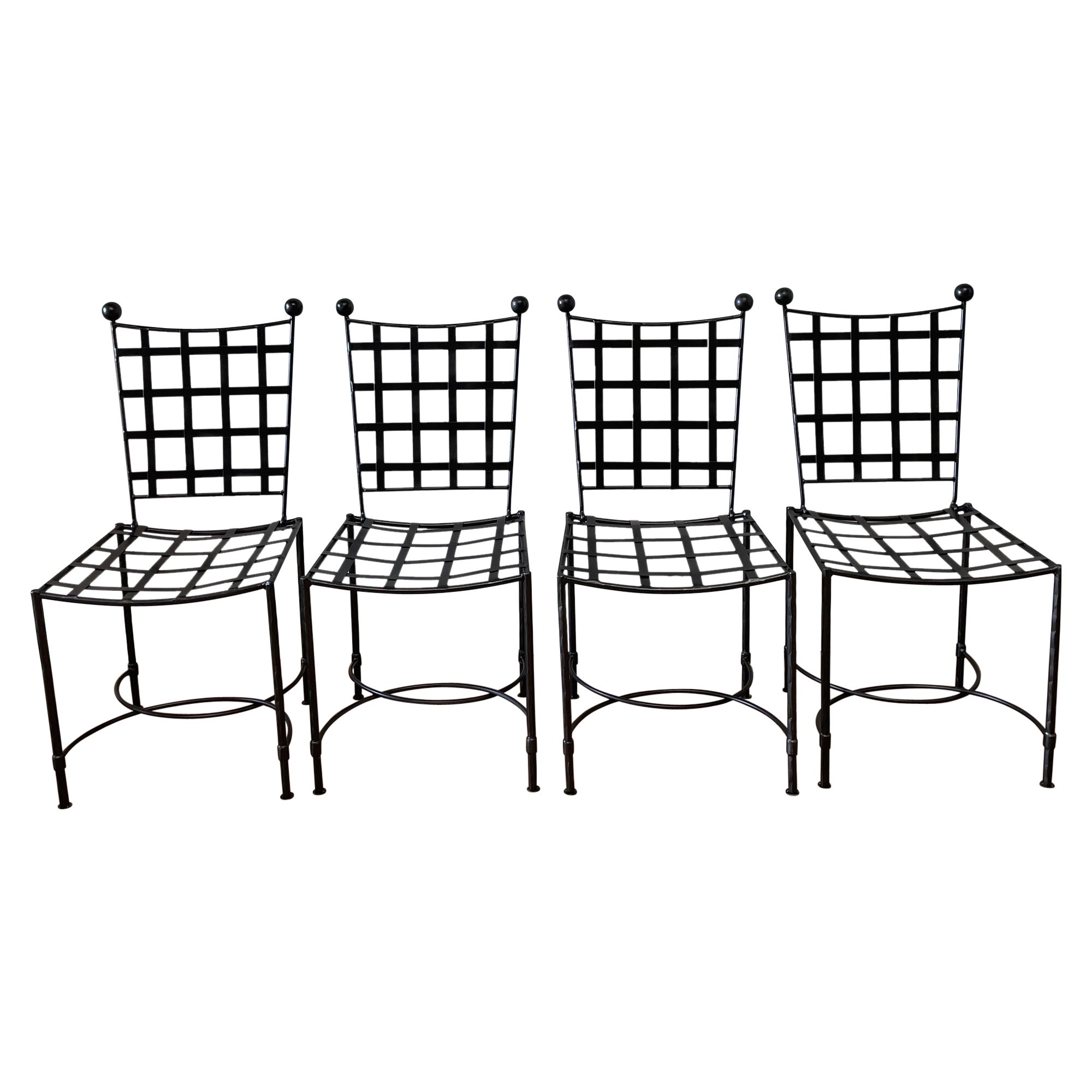 Forged iron outdoor dining chairs
Custom made to order
Size: 17” W x 20” D x 35” H at finial 32.5” H at center 
Seat height is 17