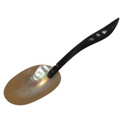 A Late 1940's Balinese Ebony and Mother of Pearl Carved Shell Caviar Spoon 