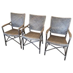 Fauteuils en rotin tissé taupe de Janus Et Cie