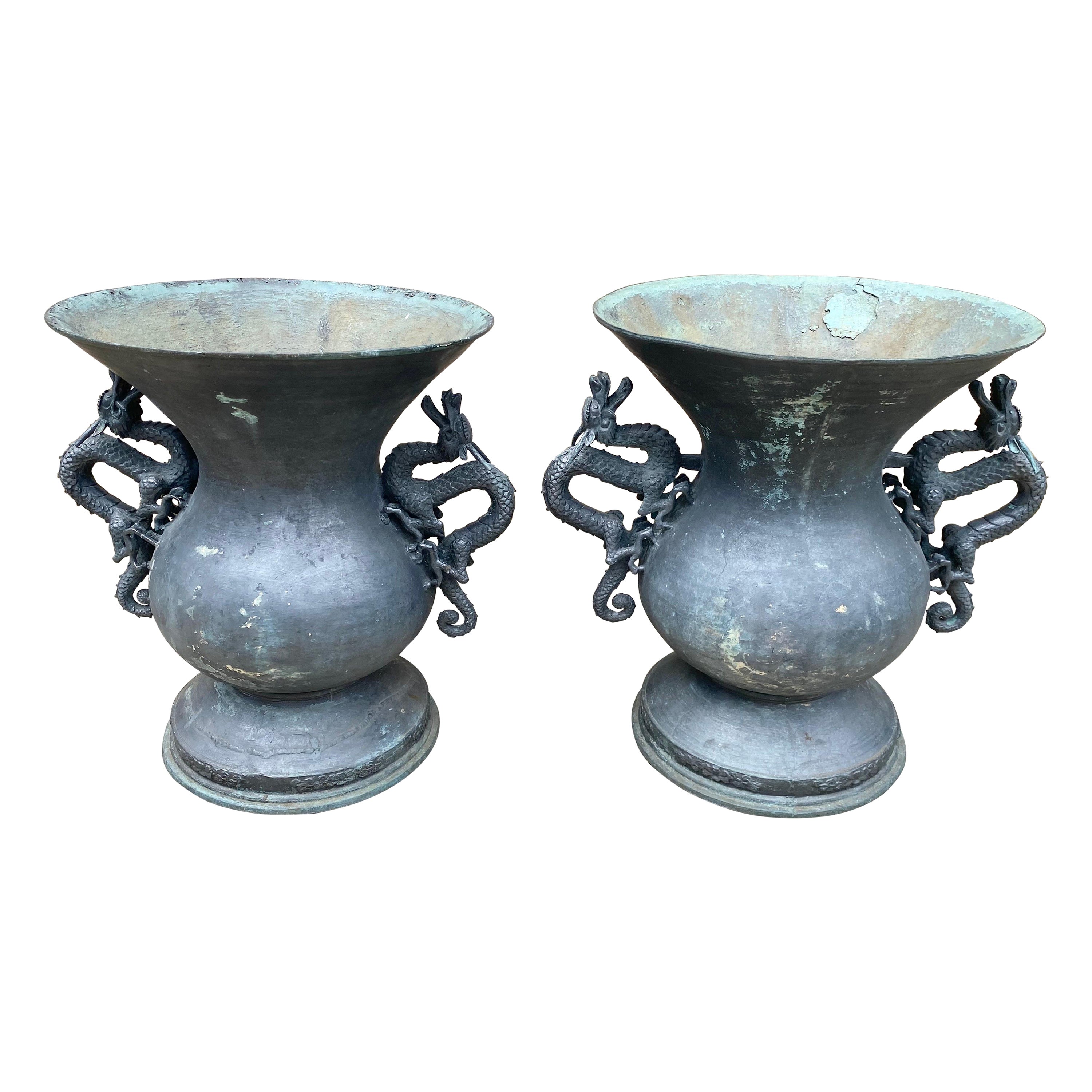 Pair of Bronze Urns with Dragon Handles For Sale