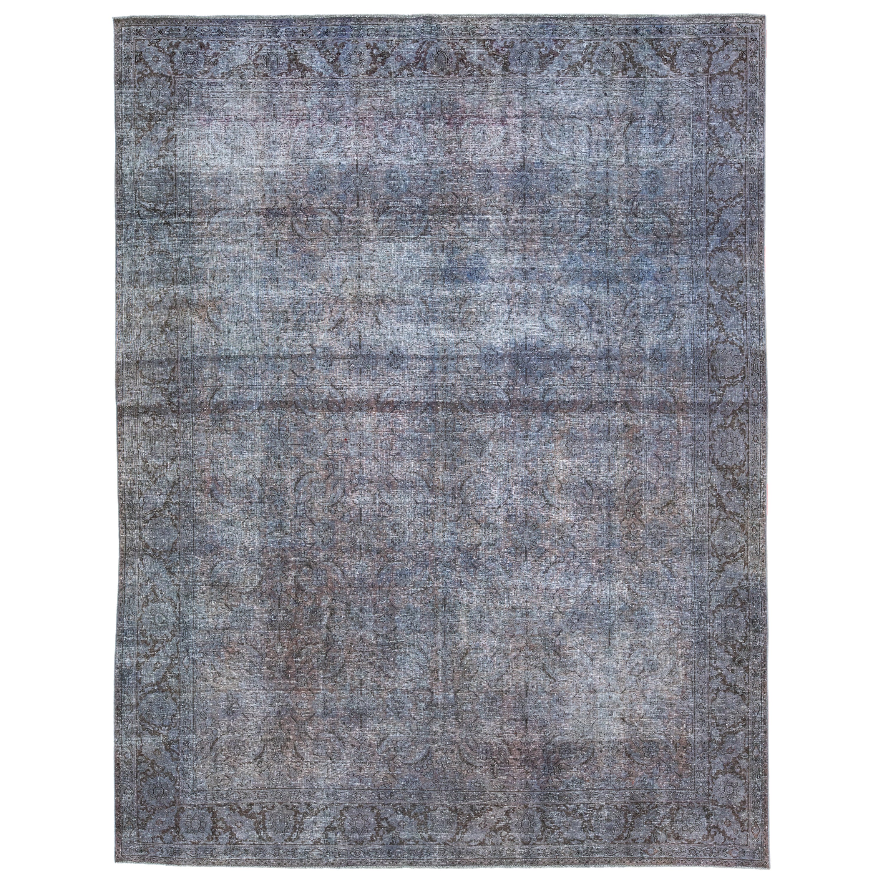 Vintage Persian Overdyed Handmade Floral Blue Wool Rug For Sale