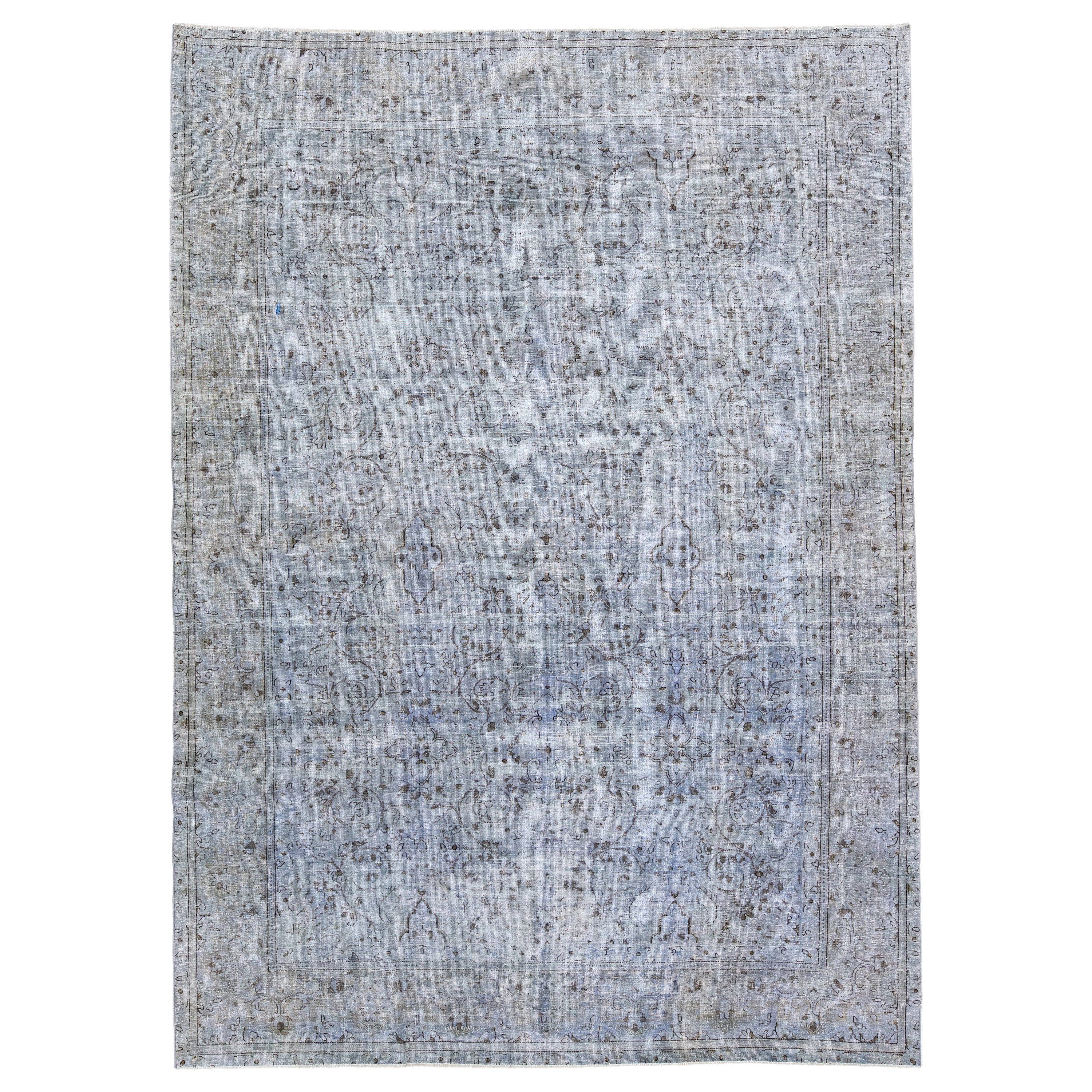 Tapis persan vintage teinté à la main en laine bleue à fleurs, fait à la main en vente