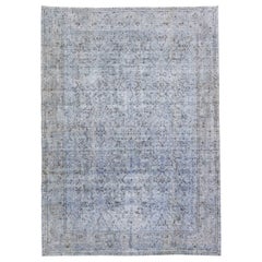 Tapis persan vintage teinté à la main en laine bleue à fleurs, fait à la main