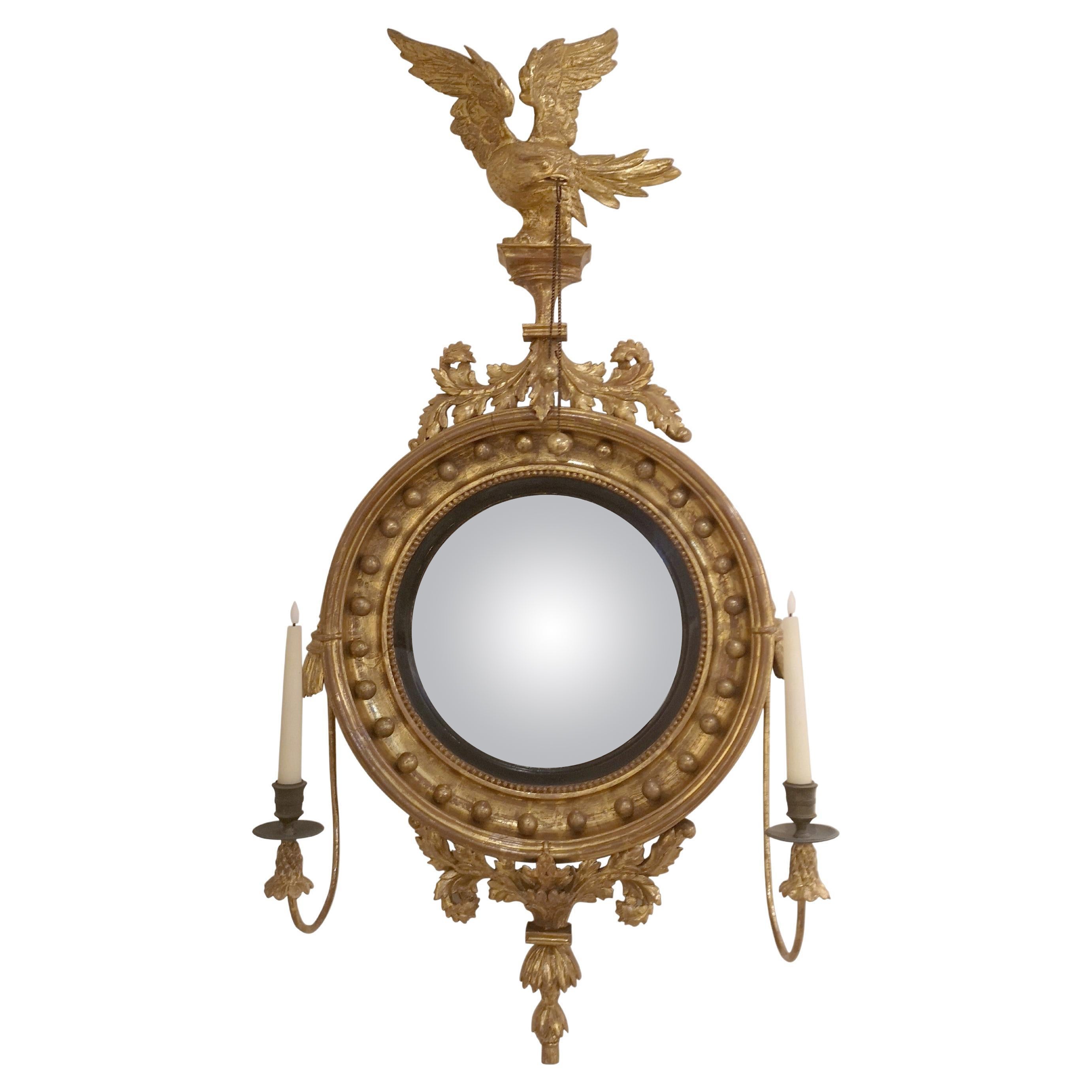 Small Gilt and Carved Convex Mirror of the Regency Period For Sale