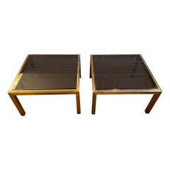 Pair of brass and glass side tables