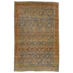 Antiker, handgefertigter, geblümter Oversize-Teppich aus rostfarbener und blauer Wolle von Bidjar