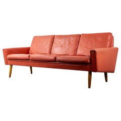 Danish Mid-Century Modern Red Leather Three Seat Sofa with Oak Legs