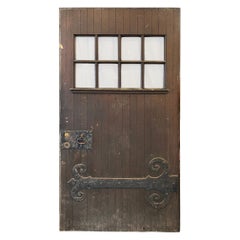 Early 20th Century Antique Oversize Door with Large Iron Hinge