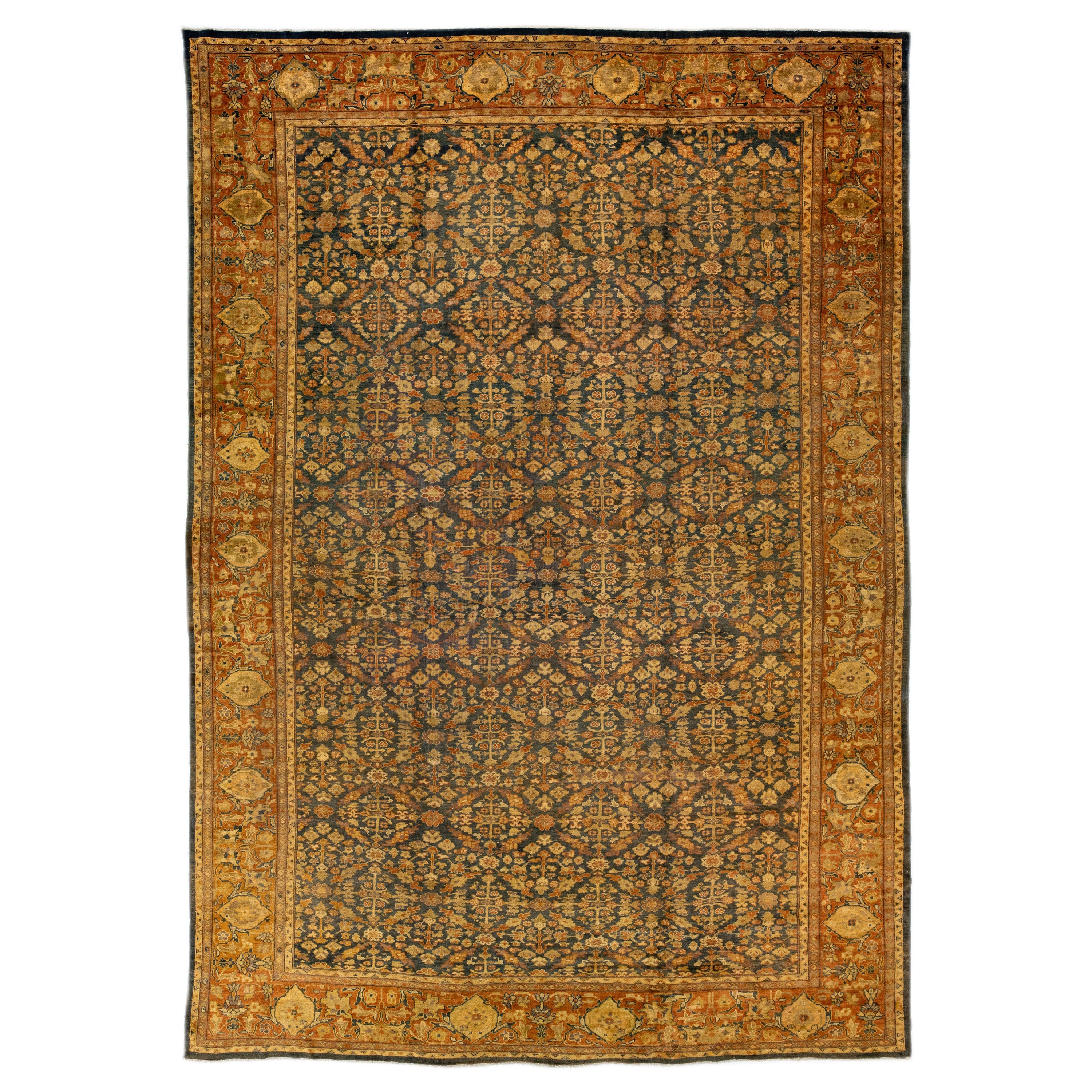 Antique Sultanabad Handmade Blue & Rust Wool Rug with Allover Floral Pattern