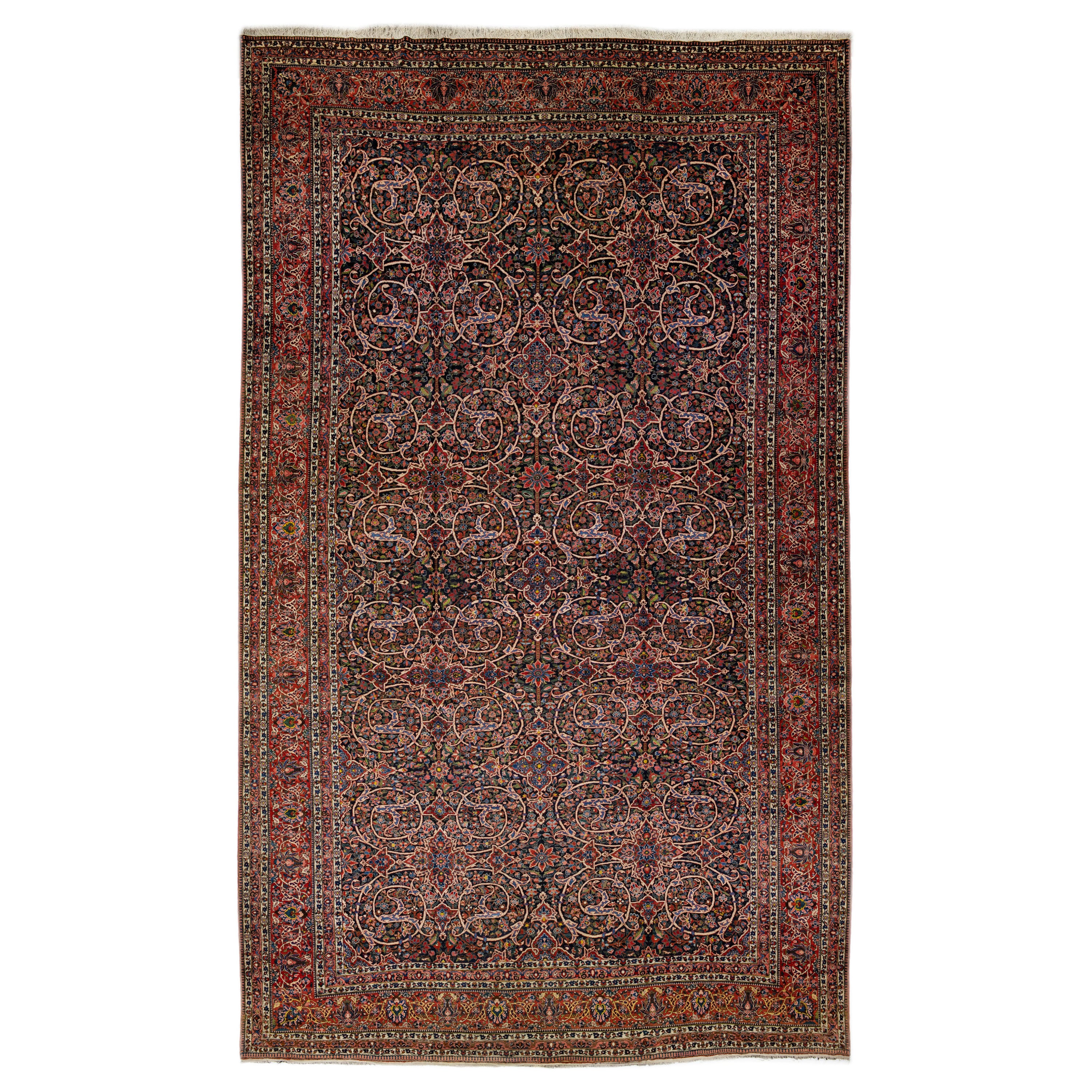 Tapis persan ancien Bakhtiari en laine rouge et bleue fait à la main avec motif floral