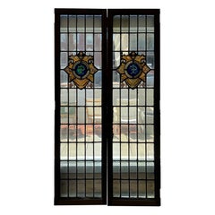Early 20th Century Antique Pair of Leaded Glass Doors with a Stained Glass