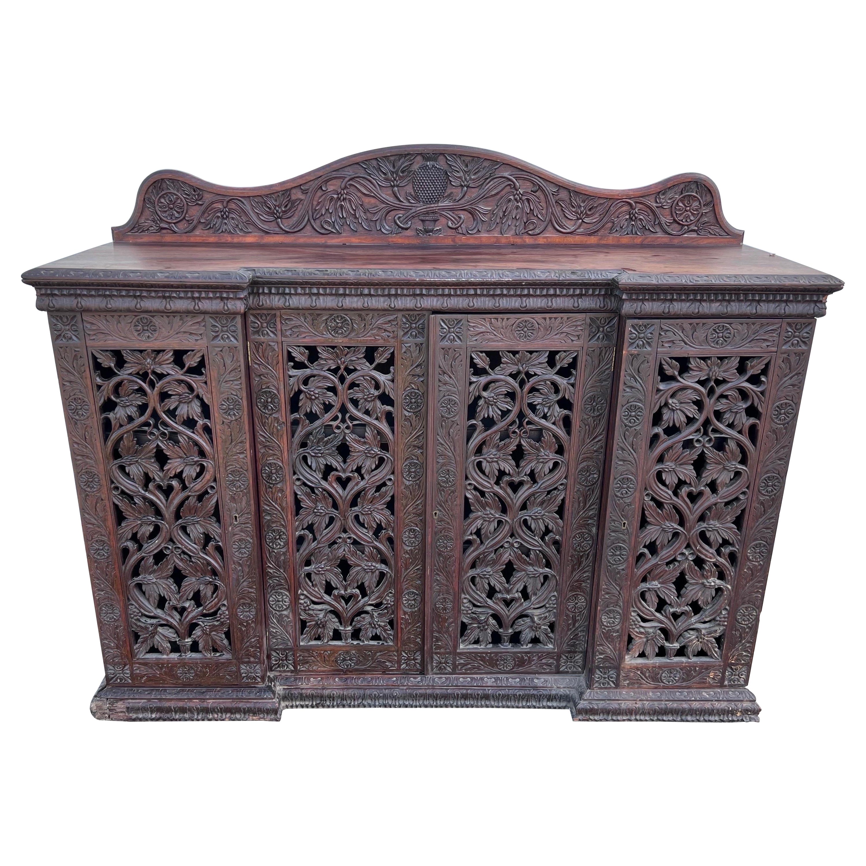 19th Century, Anglo Indian 4 Door Credenza with Carved Pineapple Backsplash For Sale