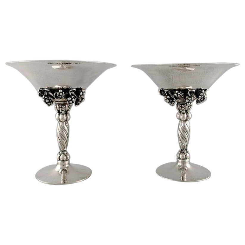 Johan Rohde for Georg Jensen, a Pair of Grape Centrepieces in Sterling Silver