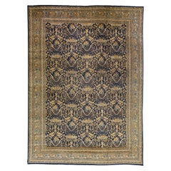 Tapis bleu ancien en laine persane Tabriz entièrement réalisé à la main et à motifs floraux