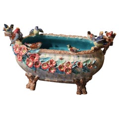19th Century French Faience Barbotine Jardiniere with Bird and Floral Motifs
