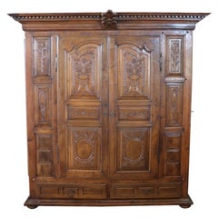 Early 18th Century Baroque Carved Walnut Antique Wardrobe, Cabinet with Secrets