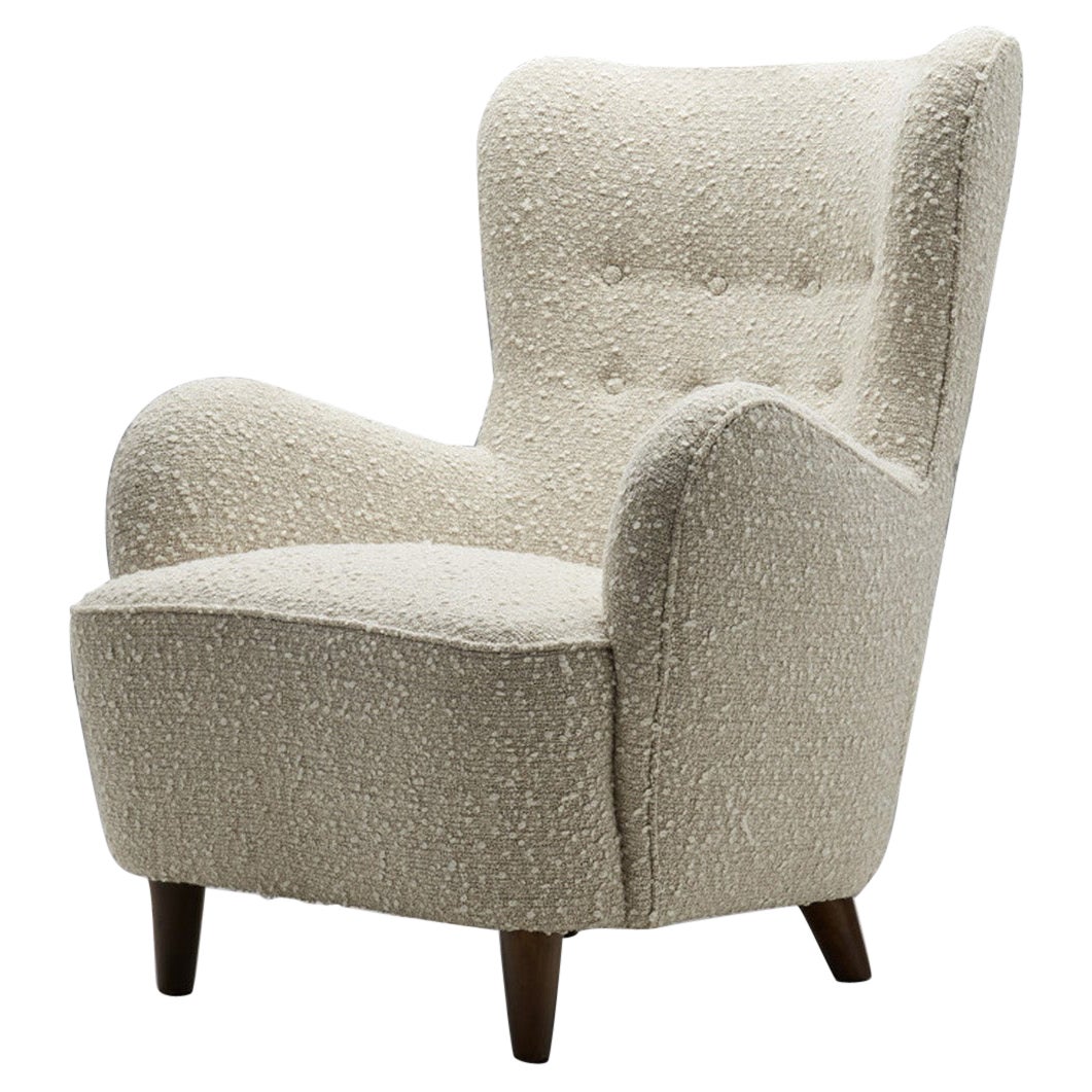 Scandinavian Wingback Armchair Upholstered in Bouclé, Scandinavia, 1950s For Sale