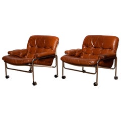 Pair 'Eva' Lounge Chairs Chrome and Aged Brown / Tan Leather by Lindlöfs Möbler