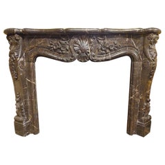 Antique Mantle Fireplace Richly Carved Black Marble, Central Shell, 19th Century, Italy