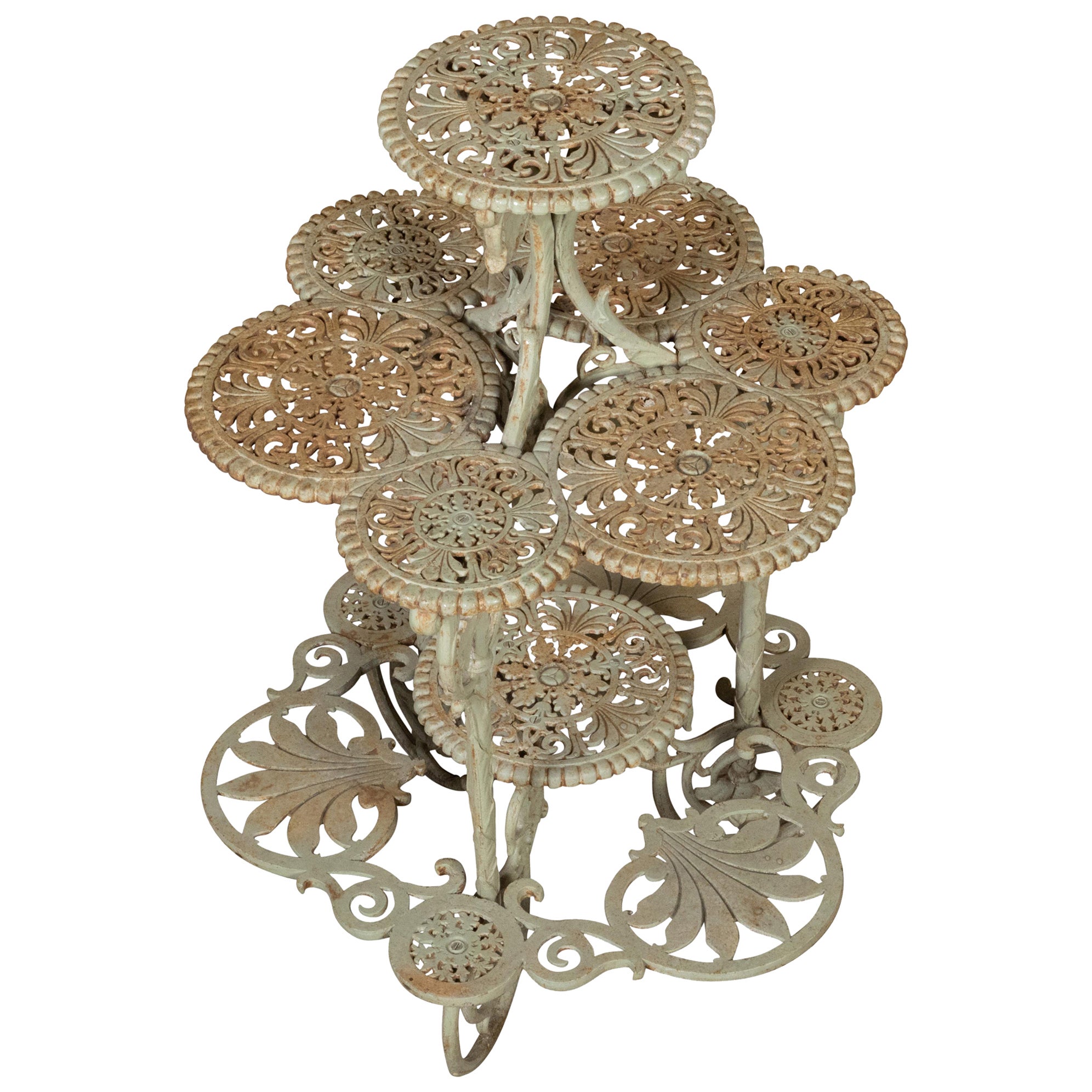 English 19th Century Painted Iron Four-Tiered Table with Foliage Openwork Motifs For Sale
