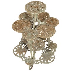 English 19th Century Painted Iron Four-Tiered Table with Foliage Openwork Motifs