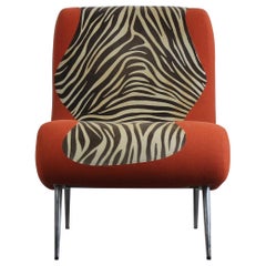 Moroso orangefarbener Sessel mit Zebradruck und Metallbeinen 1990er Jahre Italien