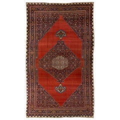 Ancien tapis Bidjar en laine rouge persane fait à la main avec motif de médaillon