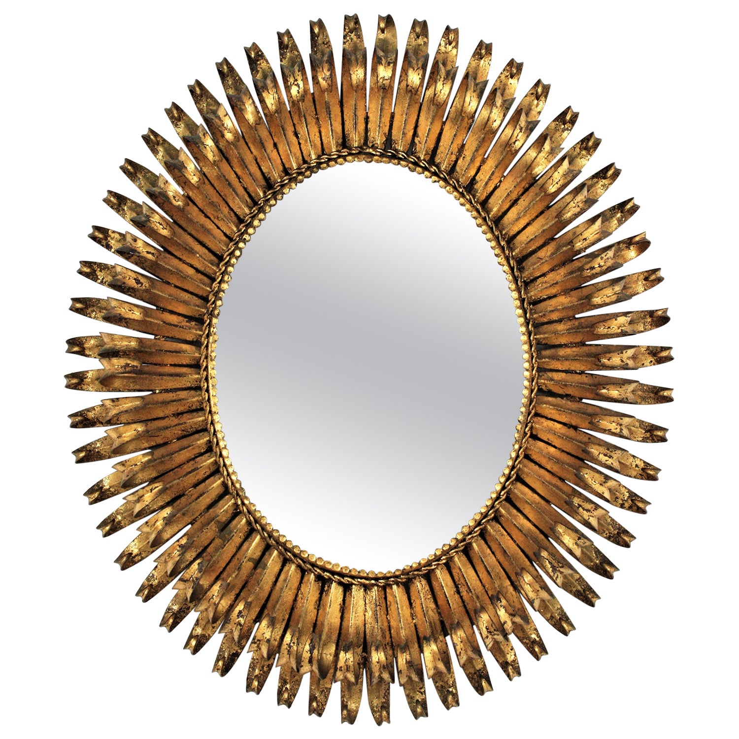Gilt Sunburst Eyelash Oval Mirror in Wrought Iron For Sale