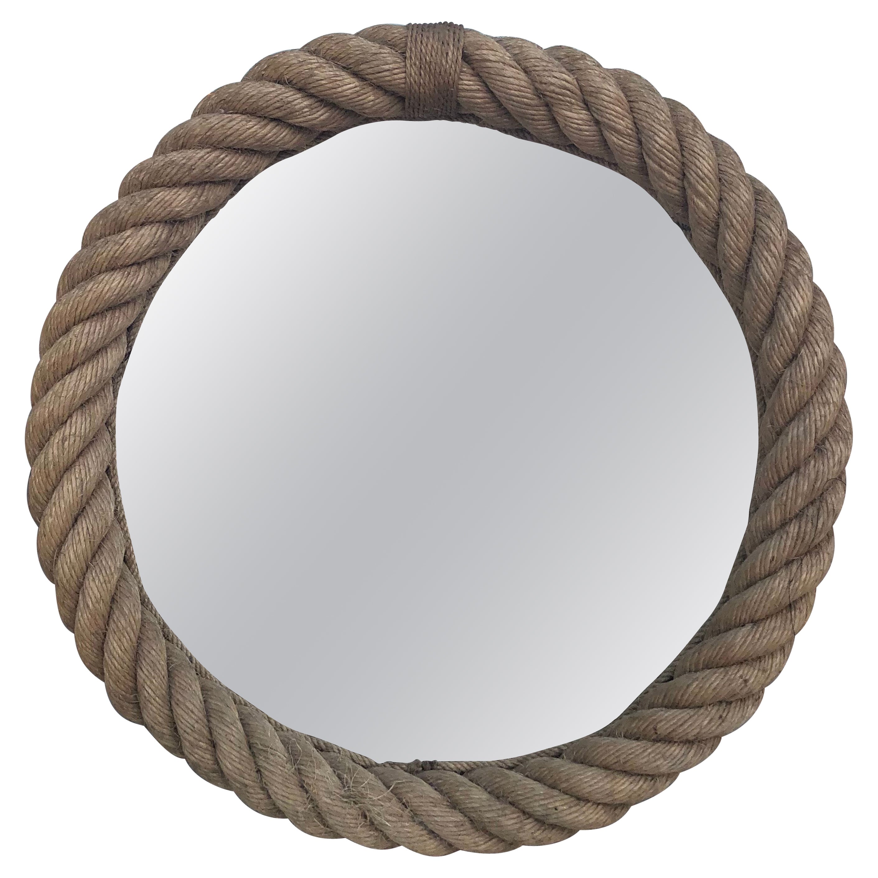 Round nautical rope mirror Audoux Minet, circa 1960.
Size: 18.3 inches diameter.