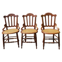 Antique Set of Three Late Victorian Walnut Inlays and Cane Seat Dining Chairs