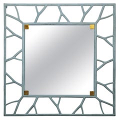 Miroir avec contour en métal gris en forme de « vigne » et détails en laiton