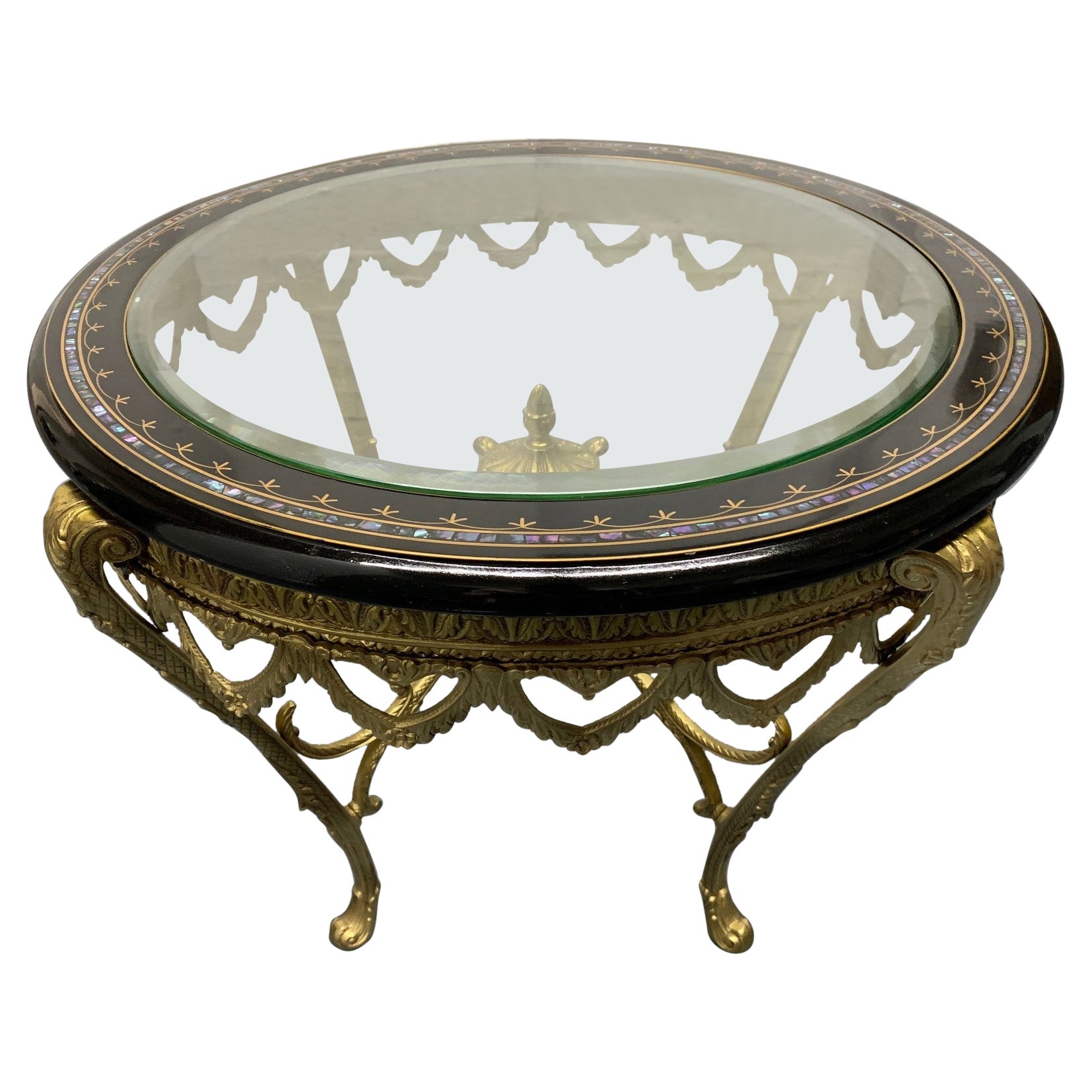 Table italienne en bronze doré avec plateau en ébène et incrustation de nacre