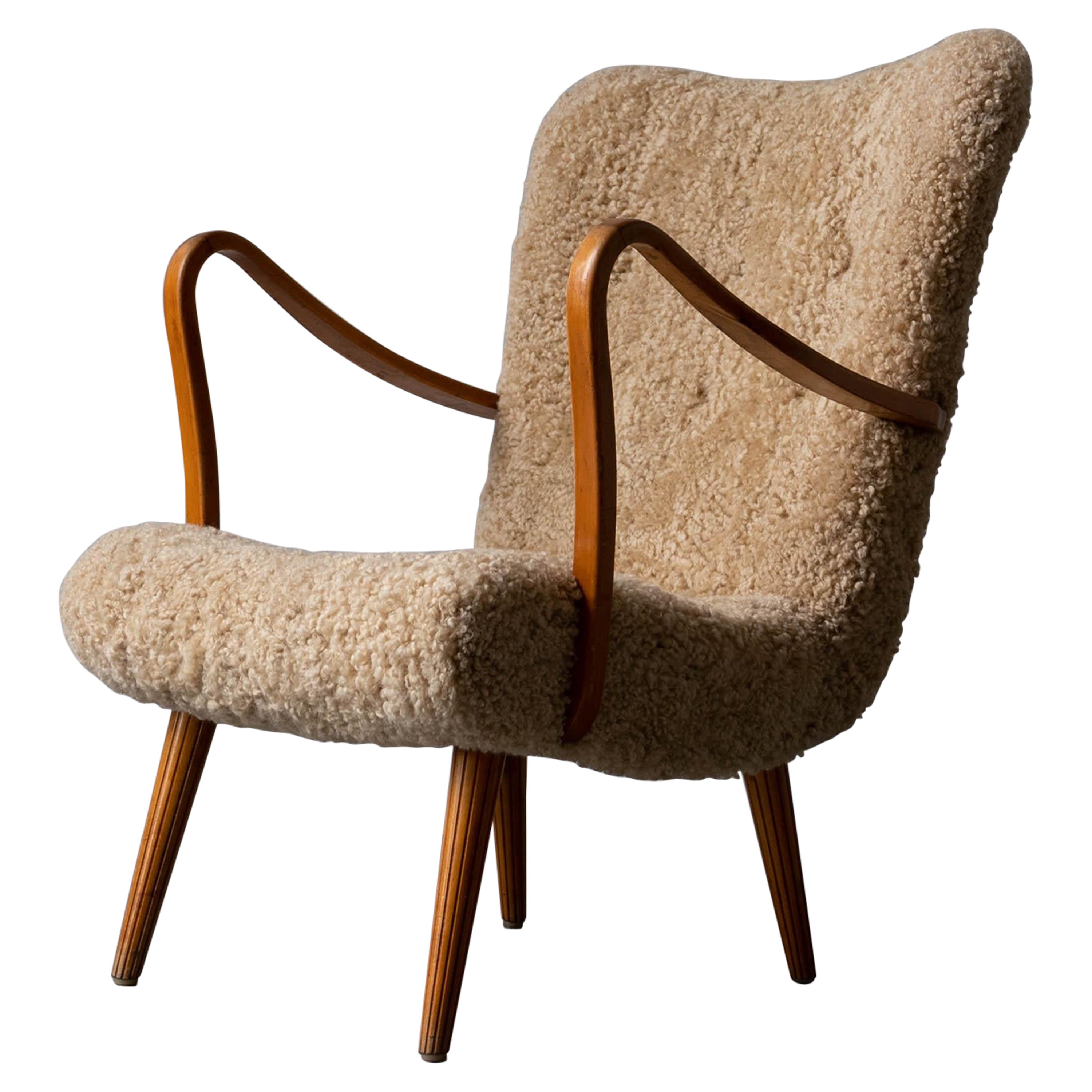 Carl Gustaf Hiort Af Ornäs, Lounge Chair, Wood, Sheepskin, Sweden, 1950s