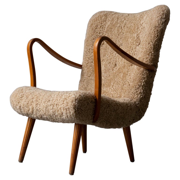 Carl Gustaf Hiort Af Ornäs, Lounge Chair, Wood, Sheepskin, Sweden, 1950s For Sale