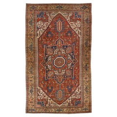 Tapis persan ancien Serapi en laine à médaillons, fait à la main, couleur rouille