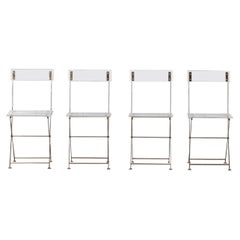 Ensemble de 4 chaises pliantes en lucite Yonel Lebovici