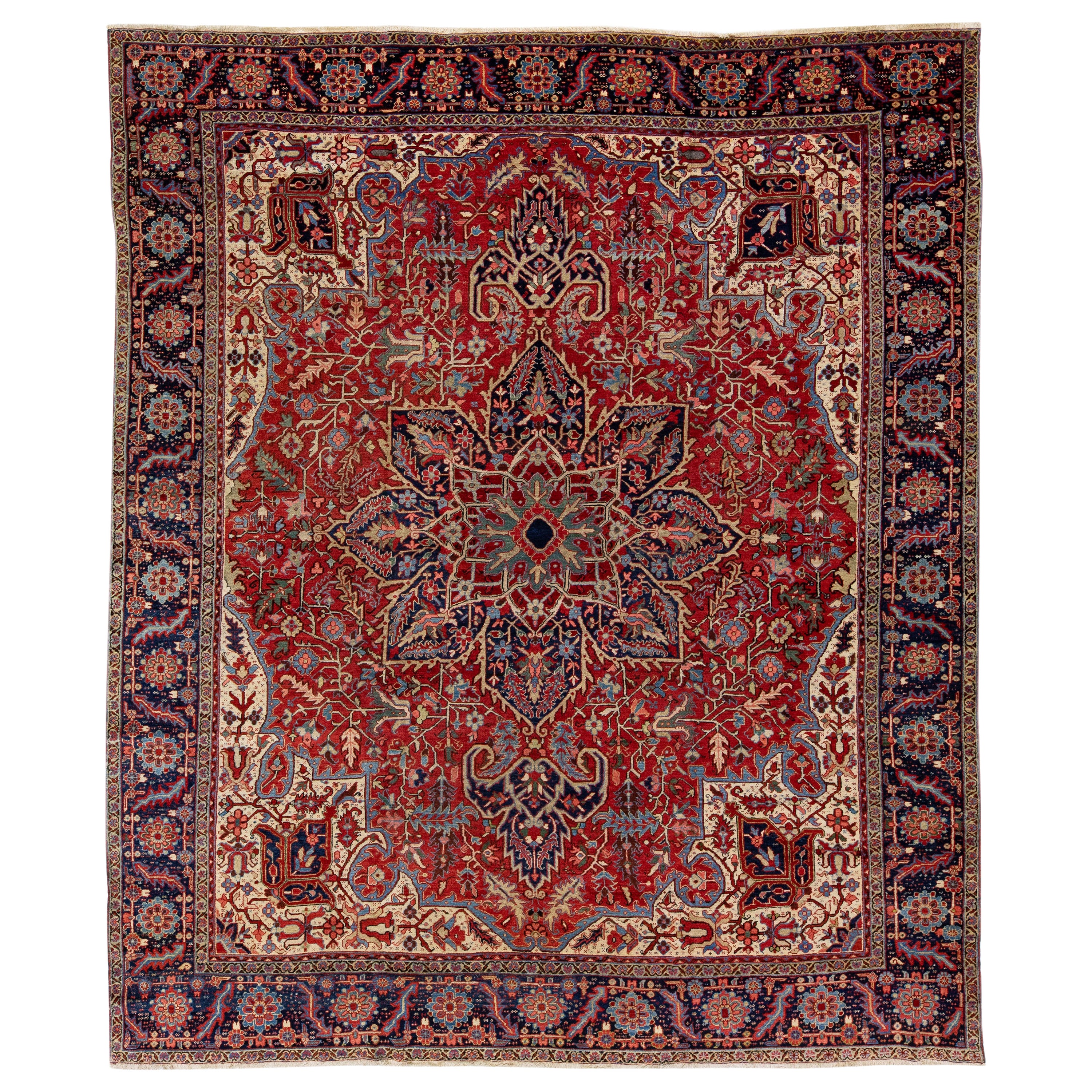 Tapis persan Heriz rouge fait à la main avec motif de médaillon multicolore