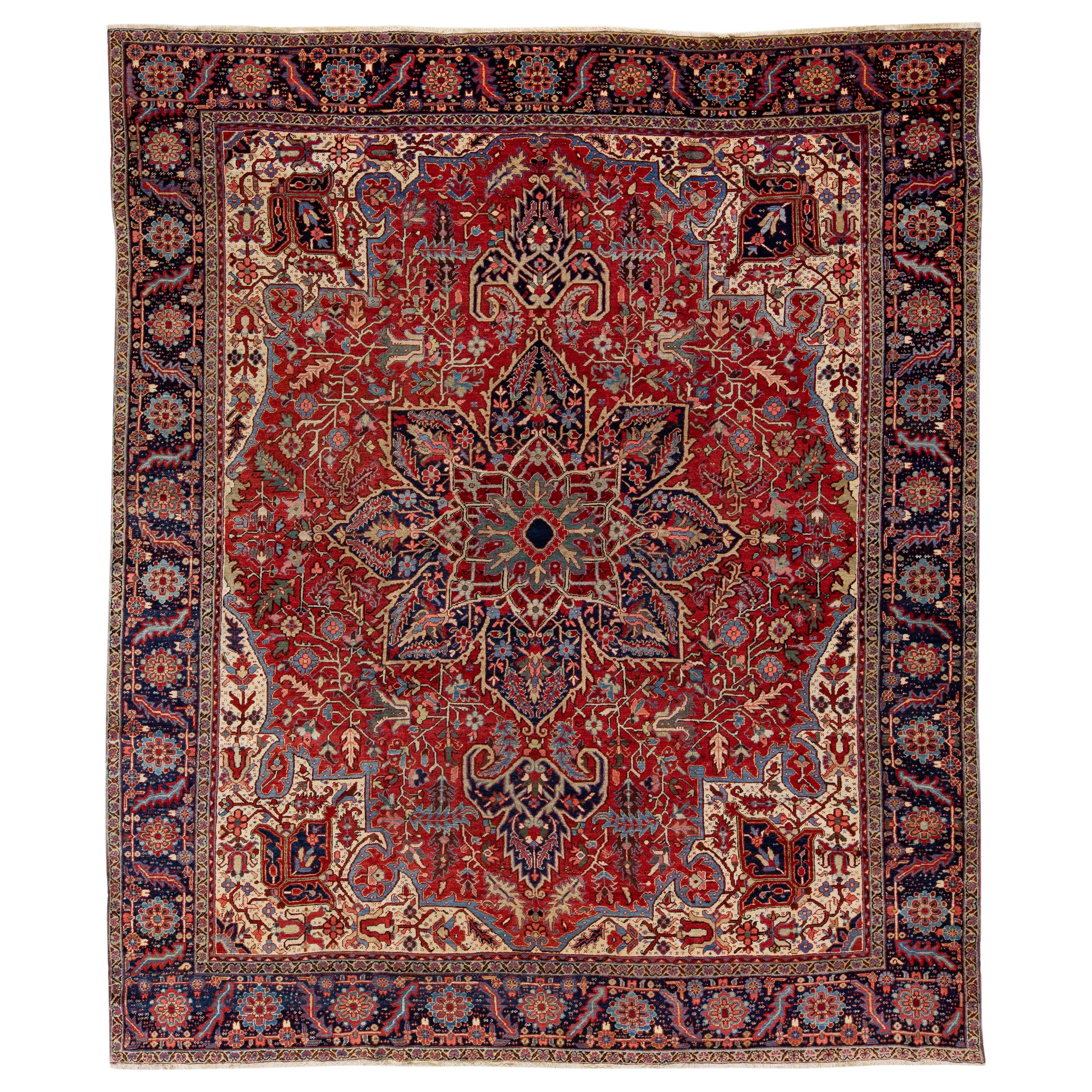 Antique Persian Heriz Red Handmade Wool Rug With Multicolor Medallion Motif For Sale