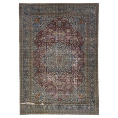 Antiker persischer Mashad-Teppich aus handgefertigter Wolle in Rot und Blau mit Rosette-Motiv