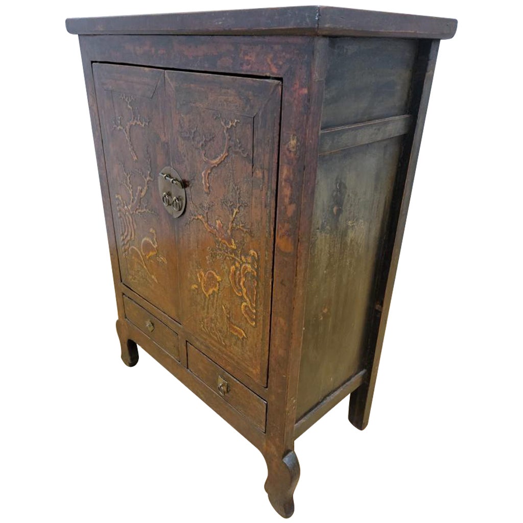 Antique Shanxi Province Elmwood Lacquered cabinet with painting on doors

This cabinet has 2 drawers and 2 shelves with hand painted doors.

Circa: 1880 

Dimensions:

W: 33.5
