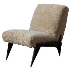 Ico Parisi 'Attribution' Slipper Chair, Dark-Stained Wood, Shearling Italy 1950s