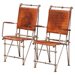 Pair of Mid-Century Peruvian Painted Wrought Iron and Leather Campaign Chairs