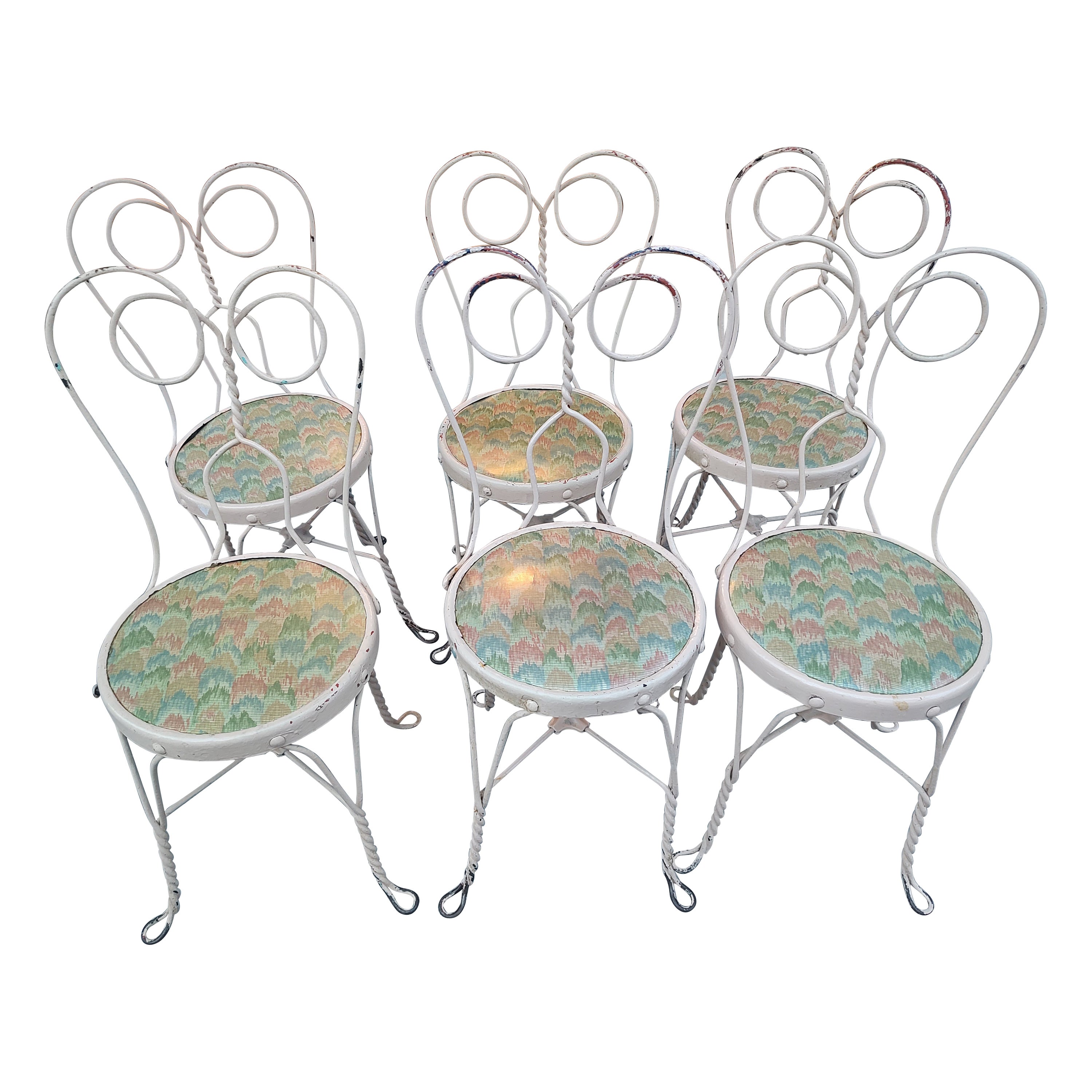 Great set of 6 ice cream parlor chairs from the late 19th century. Brand New hardwood plywood seats. Disregard seat pics with multiple color fabric. Many layers of paint on these beauties, called Owl Eyes because of the configuration of the circles