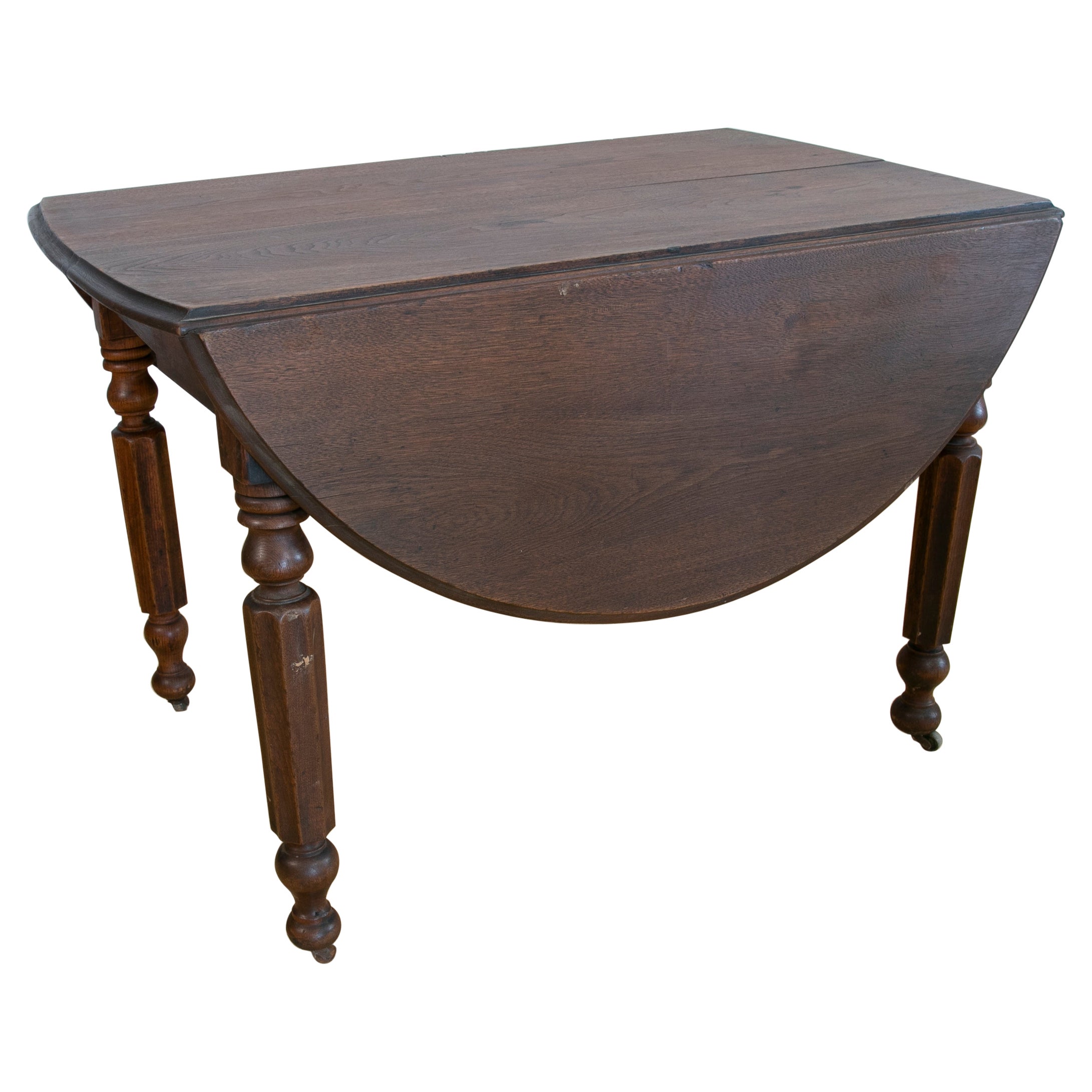 English Wooden Wing Table with Brass Wheels For Sale