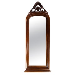 Miroir ancien en bois d'acajou, décoré de sculptures datant du milieu des années 1860