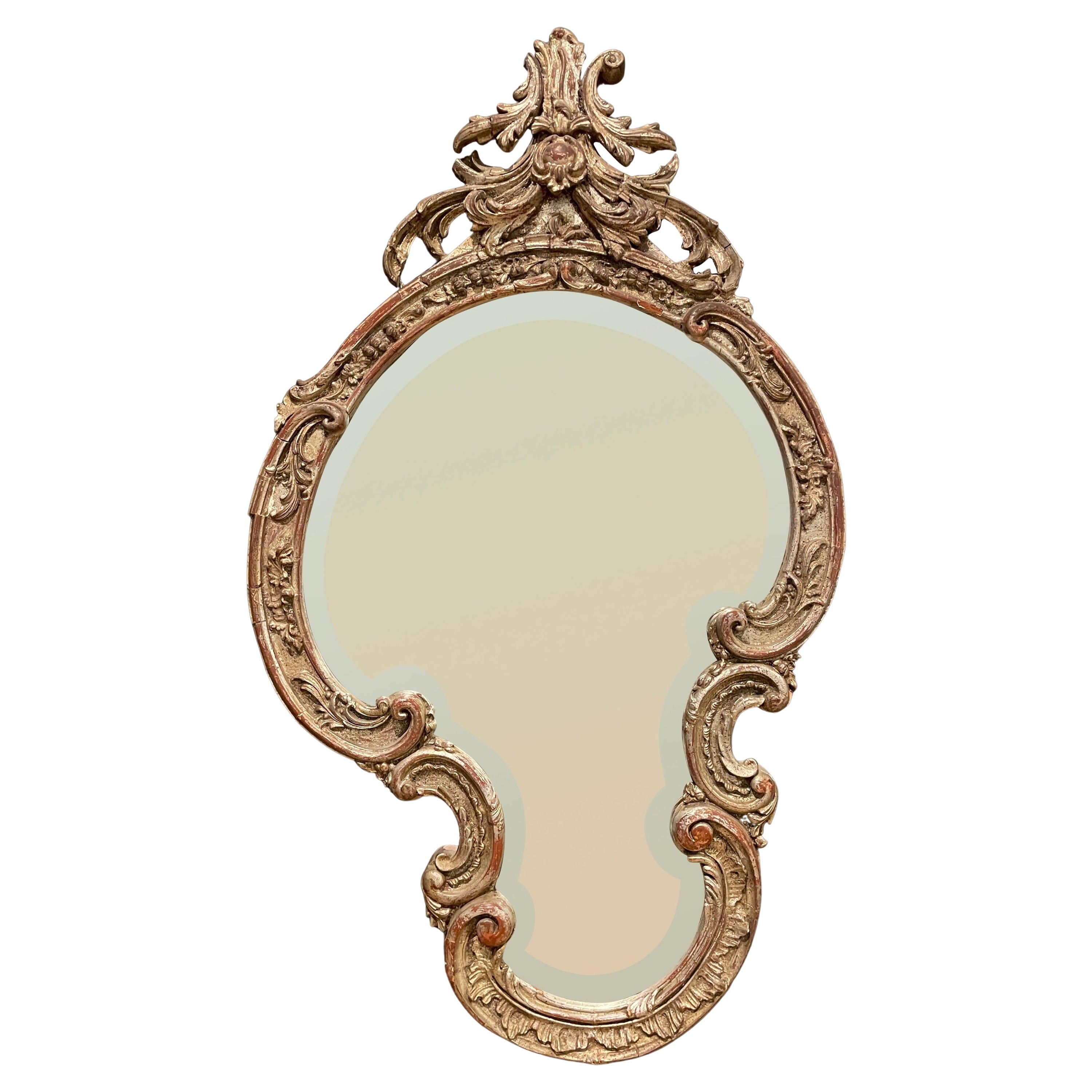 Carved and Silver Gilt Mirror