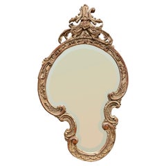 Carved and Silver Gilt Mirror