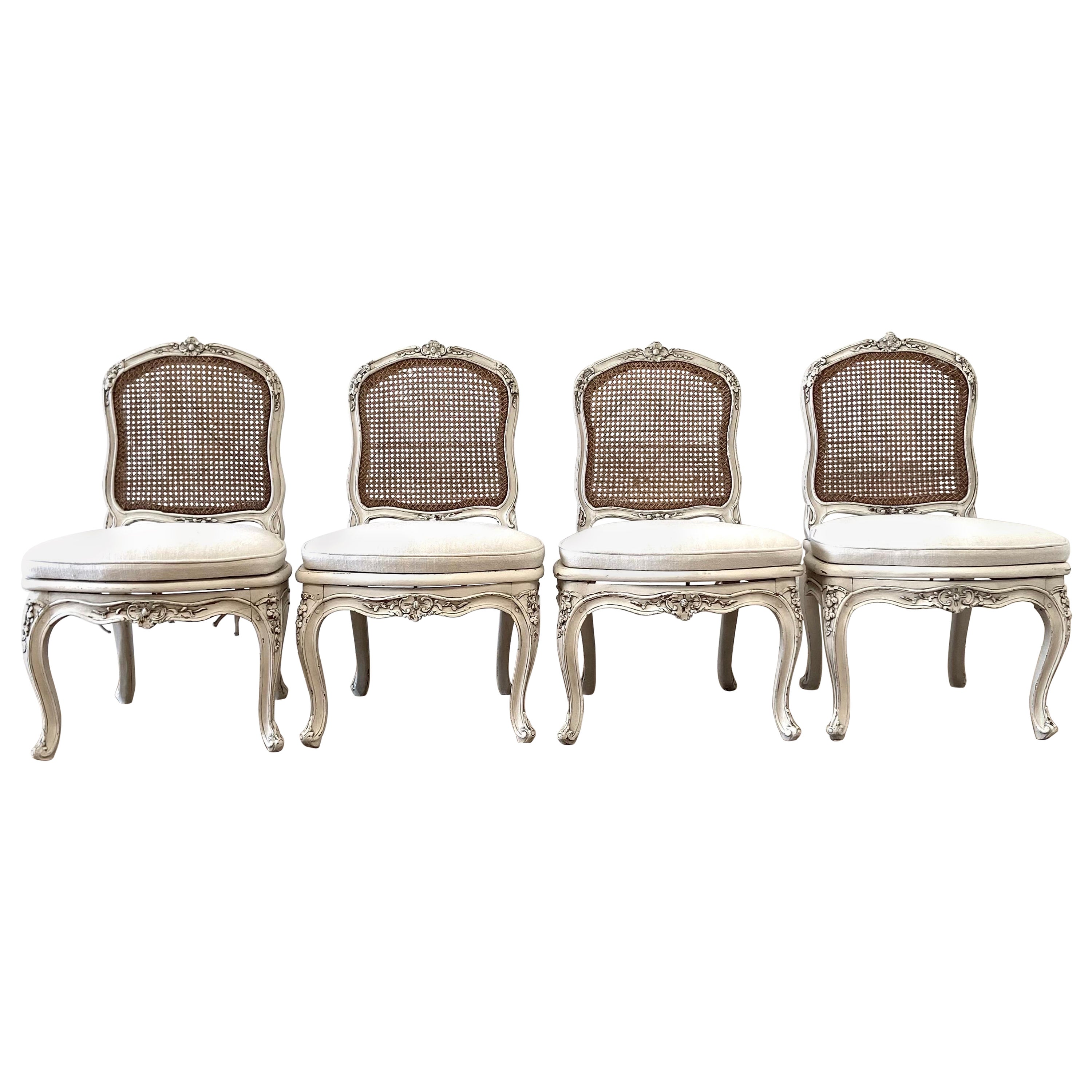 Antique French Painted Cane Back Dining Chairs with Linen Upholstery For Sale